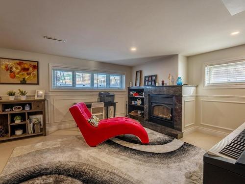 Basement - 1550 Rue De Grandes-Piles, Laval (Duvernay), QC - Indoor Photo Showing Living Room With Fireplace