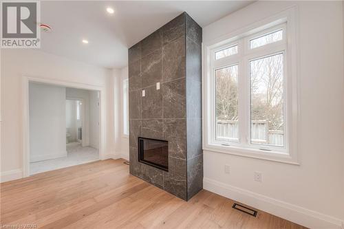 102 Dawson Street, Waterloo, ON - Indoor Photo Showing Other Room With Fireplace