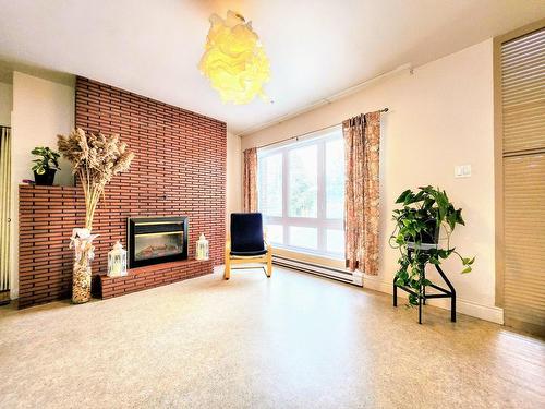 Boudoir - 2235 Place Bonenfant, Shawinigan, QC - Indoor Photo Showing Living Room With Fireplace