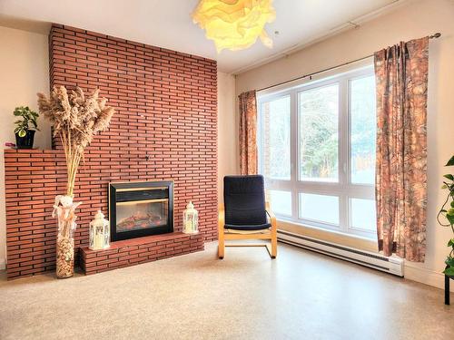 Den - 2235 Place Bonenfant, Shawinigan, QC - Indoor Photo Showing Living Room With Fireplace