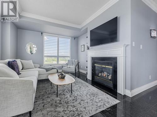 #Lph 8 -2111 Lake Shore Blvd  W, Toronto, ON - Indoor Photo Showing Living Room With Fireplace