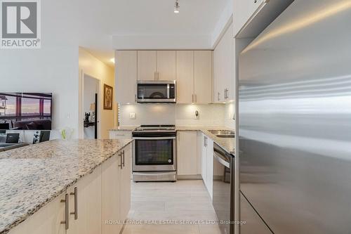 #1708 -4655 Glen Erin Dr, Mississauga, ON - Indoor Photo Showing Kitchen With Stainless Steel Kitchen With Upgraded Kitchen