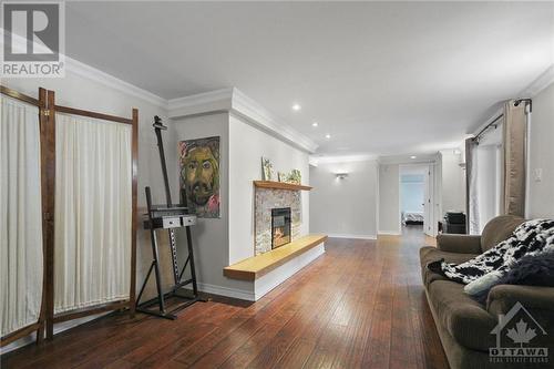 5448 North Drive, Ottawa, ON - Indoor Photo Showing Living Room With Fireplace