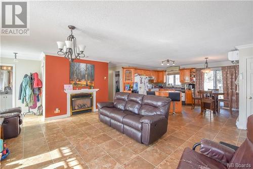 521 Rue Boisjoli, Tracadie, NB - Indoor Photo Showing Living Room With Fireplace