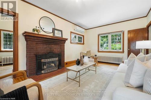 3855 St James Ave, Niagara Falls, ON - Indoor Photo Showing Living Room With Fireplace
