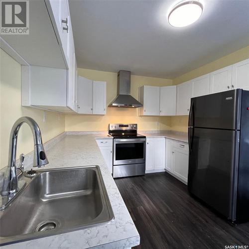 852 109Th Street, North Battleford, SK - Indoor Photo Showing Kitchen With Double Sink