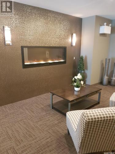 204 415 Maningas Bend, Saskatoon, SK - Indoor With Fireplace