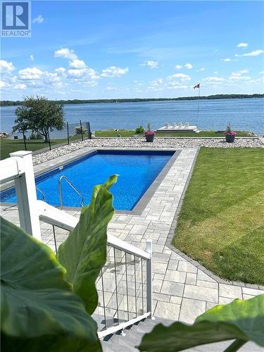 16064 Lakeside Drive S, Long Sault, ON - Outdoor With Body Of Water With In Ground Pool With View