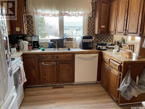 303 Westview Drive, Coronach, SK - Indoor Photo Showing Kitchen With Double Sink