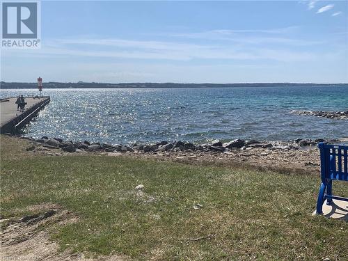 COLPOYS BAY DOCK FOR FISHING AND SWIMMING - 15 3Rd Avenue, South Bruce Peninsula, ON - Outdoor With Body Of Water With View