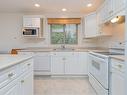 836 Mulholland Dr, Parksville, BC  - Indoor Photo Showing Kitchen With Double Sink 