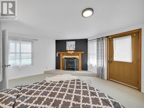11890 Riverside Drive East Unit# B, Windsor, ON - Indoor With Fireplace