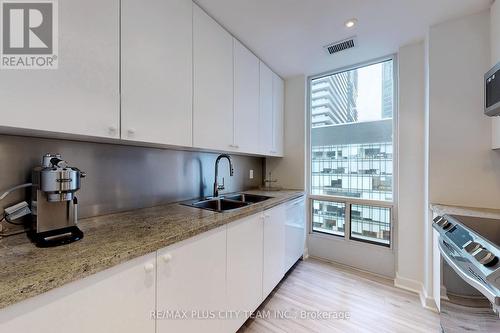 910 - 85 Bloor Street E, Toronto, ON - Indoor Photo Showing Kitchen With Double Sink