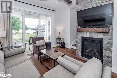 1869 Muskoka Road 118 Highway W Unit# Bhv-C101A&B, Muskoka Lakes, ON - Indoor Photo Showing Living Room With Fireplace
