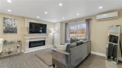249 Highway 8, Stoney Creek, ON - Indoor Photo Showing Living Room With Fireplace