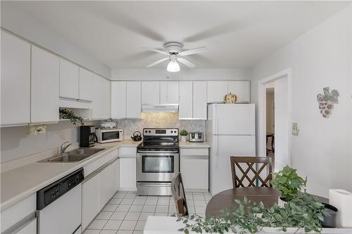 6 Village Green Boulevard|Unit #505, Stoney Creek, ON - Indoor Photo Showing Kitchen With Double Sink