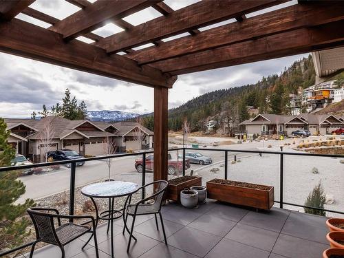 203-4000 Redstone Crescent, Peachland, BC - Outdoor With Fireplace With Exterior
