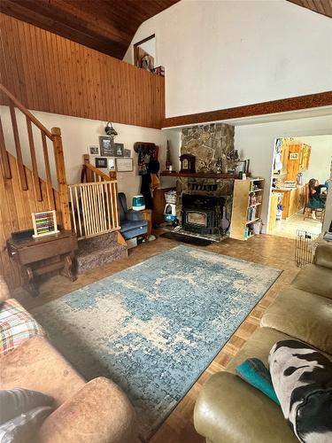8265 China Valley Road, Falkland, BC - Indoor Photo Showing Living Room With Fireplace