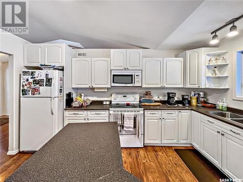 24 Saskatchewan Drive, Candle Lake, SK - Indoor Photo Showing Kitchen With Double Sink
