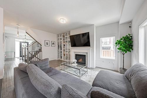 30 Times Square Boulevard|Unit #173, Hamilton, ON - Indoor Photo Showing Living Room With Fireplace