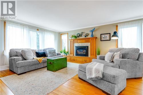15907 Manning Road, Ingleside, ON - Indoor Photo Showing Living Room With Fireplace