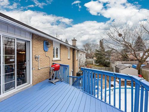 Patio - 16 Rue Hazelwood, Dollard-Des-Ormeaux, QC - Outdoor With Above Ground Pool With Deck Patio Veranda With Exterior