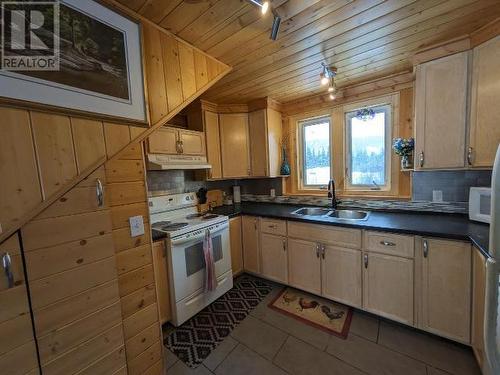 249 Eureka Drive, Dawson City, YT - Indoor Photo Showing Kitchen With Double Sink