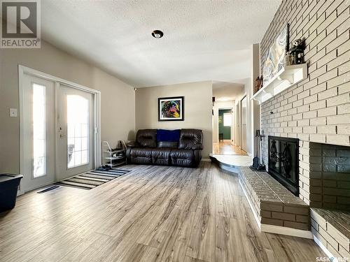 11203 Gardiner Drive, North Battleford, SK - Indoor Photo Showing Living Room With Fireplace