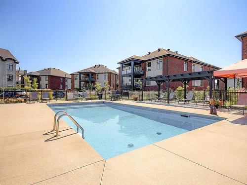 Pool - 301-2215 Place Des Tilleuls, Saint-Bruno-De-Montarville, QC - Outdoor With In Ground Pool