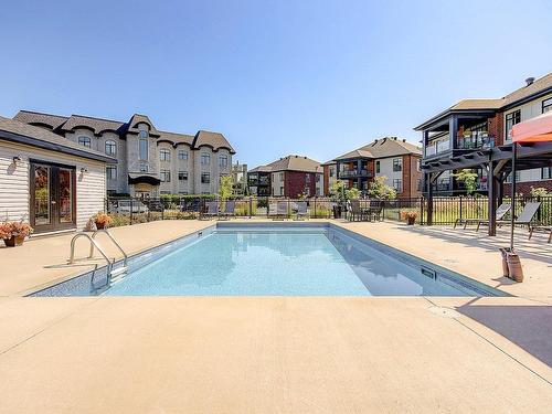 Pool - 301-2215 Place Des Tilleuls, Saint-Bruno-De-Montarville, QC - Outdoor With In Ground Pool