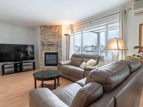 Salon - 6125 Rue Du Cormoran, Brossard, QC - Indoor Photo Showing Living Room With Fireplace