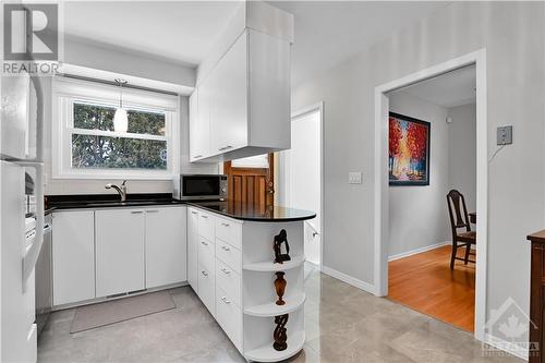 KITCHEN | quartz counter top, luxury vinyl floor - 1417 Duford Drive, Orleans, ON - Indoor Photo Showing Kitchen With Double Sink