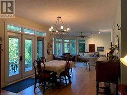 Next, find the expansive dining and living room areas. - 