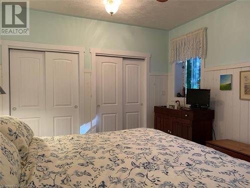 Master offers his & hers closets. - 61 North Shore Road, Northern Bruce Peninsula, ON - Indoor Photo Showing Bedroom