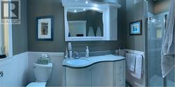 There you find the 2nd full bathroom with custom walk-in shower. - 
