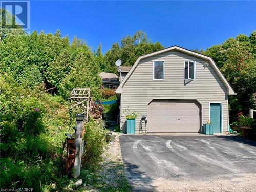 Oversized 24ft x 32ft two storey detached garage is insulated and heated. - 61 North Shore Road, Northern Bruce Peninsula, ON - Outdoor