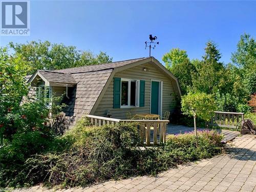 The upper level of the garage offers 'walk-in' entry from the back. - 61 North Shore Road, Northern Bruce Peninsula, ON - Outdoor