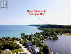 Little Lake has a natural 6-8ft channel that provides boat access to Georgian Bay. - 