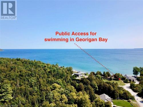 A public access to main body Georgian Bay is also steps away from the property to enjoy crystal clear swimming if you prefer. - 61 North Shore Road, Northern Bruce Peninsula, ON - Outdoor With Body Of Water With View