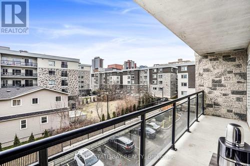 H404 - 275 Larch Street, Waterloo, ON - Outdoor With Balcony With Exterior