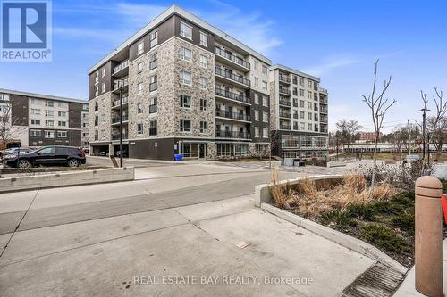 H404 - 275 Larch Street, Waterloo, ON - Outdoor With Balcony With Facade