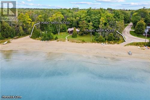 Enjoy access to the beach. - Not of subject property. - 31 Henwood Street, Stokes Bay, ON - Outdoor With Body Of Water With View