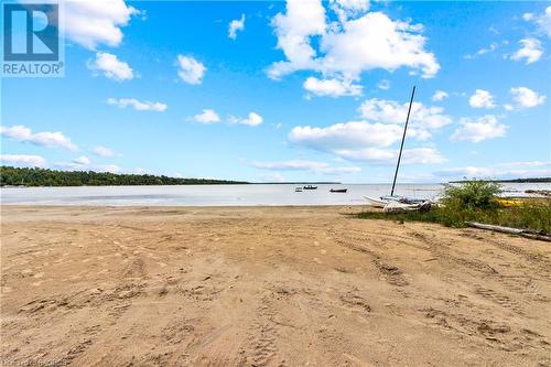Watch stunning sunsets... - Not of subject property. - 31 Henwood Street, Stokes Bay, ON - Outdoor With Body Of Water With View
