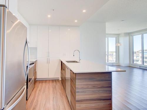 Kitchen - 604-2200 Rue Sauvé O., Montréal (Ahuntsic-Cartierville), QC - Indoor Photo Showing Kitchen With Upgraded Kitchen