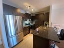 Cuisine - 304-3755 Av. Jean-Béraud, Laval (Chomedey), QC  - Indoor Photo Showing Kitchen With Double Sink 