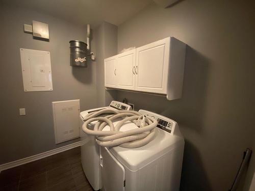 Salle de lavage - 304-3755 Av. Jean-Béraud, Laval (Chomedey), QC - Indoor Photo Showing Laundry Room