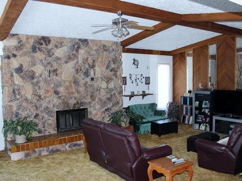 219 Second Street, Rainy River, ON - Indoor Photo Showing Living Room With Fireplace