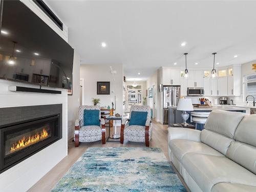 597 Nighthawk Avenue, Vernon, BC - Indoor Photo Showing Living Room With Fireplace