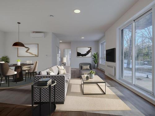 Overall view - 203-2010 Rue De Chambly, Saint-Bruno-De-Montarville, QC - Indoor Photo Showing Living Room With Fireplace