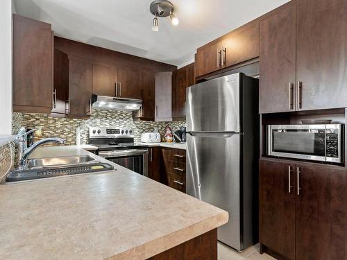 Cuisine - 3-5865 Boul. Chevrier, Brossard, QC - Indoor Photo Showing Kitchen With Double Sink With Upgraded Kitchen